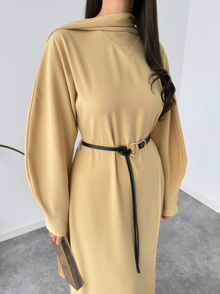 YELLOW MAXI DRESS WITH SHAWL DETAIL AT THE NECK AND BELTED WAIST.